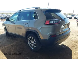 2021 Jeep Cherokee Altitude with VIN 1C4PJLLBXMD155096, listed as a IAAI auction lot 41746319 with 99,423 mi miles and . Bid and sale history available at DreamBid. Image 3.
