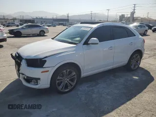 2015 Audi Q3 Prestige with VIN WA1FFCFS5FR008970, listed as a Copart auction lot 63481644 with 103,795 mi miles and Salvage title. Bid and sale history available at DreamBid. Image 1.