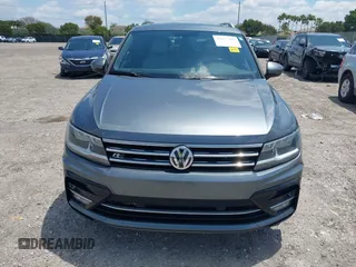 2018 Volkswagen Tiguan SEL with VIN 3VV3B7AX9JM178291, listed as a IAAI auction lot 42033485 with 65,641 mi miles and . Bid and sale history available at DreamBid. Image 6.