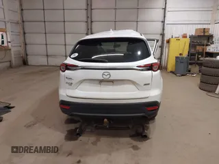 2016 Mazda CX-9 Touring with VIN JM3TCBCY3G0114707, listed as a IAAI auction lot 42023034 with 225,281 mi miles and . Bid and sale history available at DreamBid. Image 16.