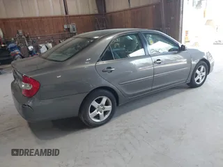 2004 Toyota Camry LE with VIN 4T1BE32K44U854932, listed as a IAAI auction lot 42133289 with 196,613 mi miles. Bid and sale history available at carsss.com. Image 4.