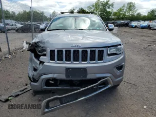 2015 Jeep Grand Cherokee Overland with VIN 1C4RJFCG3FC880084, listed as a Copart auction lot 57291165 with 112,442 mi miles and Salvage title. Bid and sale history available at DreamBid. Image 5.