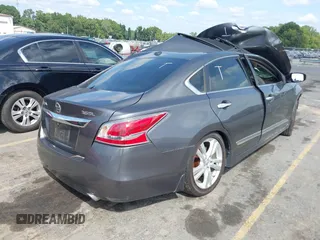 2015 Nissan Altima SL with VIN 1N4BL3AP8FC112779, listed as a IAAI auction lot 39860990 with Not Provided miles and . Bid and sale history available at carsss.com. Image 4.