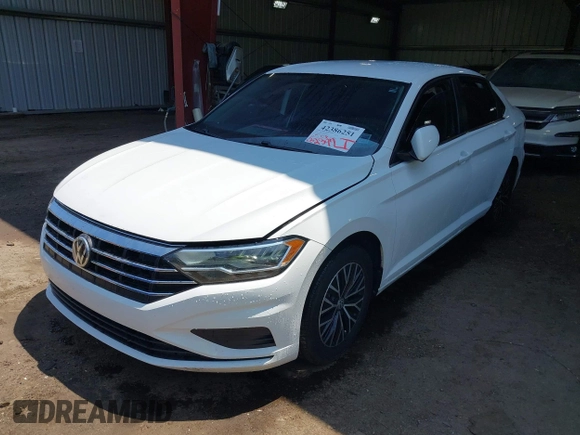 2021 Volkswagen Jetta S with VIN 3VWC57BU0MM086014, listed as a IAAI auction lot 42386251 with 82,397 mi miles and . Bid and sale history available at DreamBid. Image 2.
