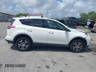2016 Toyota RAV4 LE with VIN JTMZFREV2GJ096782, listed as a IAAI auction lot 41945319 with 76,866 mi miles. Bid and sale history available at carsss.com. Image 14.