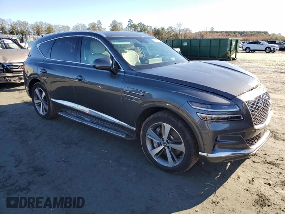 2022 Genesis GV80 Advanced Plus with VIN KMUHCESC4NU075604, listed as a Copart auction lot 81879594 with 34,330 mi miles and Salvage title. Bid and sale history available at DreamBid. Image 4.
