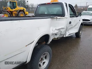 1999 Ford F-150 with VIN 2FTZF1821XCA29298, listed as a IAAI auction lot 41652750 with Not provided miles and . Bid and sale history available at DreamBid. Image 6.