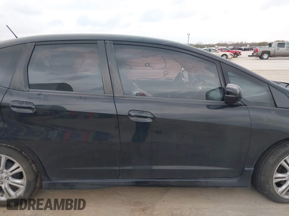 2009 Honda Fit Sport with VIN JHMGE88499S027610, listed as a IAAI auction lot 41712904 with 147,069 mi miles. Bid and sale history available at carsss.com. Image 13.