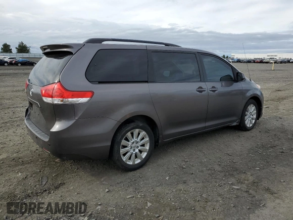 2014 Toyota Sienna LE with VIN 5TDJK3DC7ES073648, listed as a Copart auction lot 50554095 with 136,236 mi miles and Salvage Title. Bid and sale history available at DreamBid. Image 3.