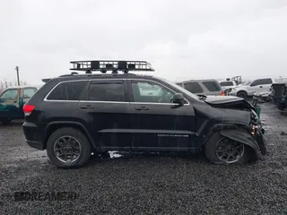 2015 Jeep Grand Cherokee Laredo with VIN 1C4RJFAGXFC602544, listed as a IAAI auction lot 41504666 with 190,170 mi miles. Bid and sale history available at carsss.com. Image 13.