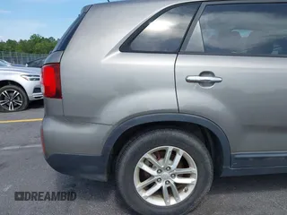 2014 Kia Sorento LX with VIN 5XYKT3A60EG486699, listed as a IAAI auction lot 42143270 with 127,190 mi miles and . Bid and sale history available at DreamBid. Image 6.