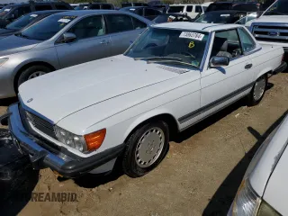 1989 Mercedes-Benz 560 with VIN WDBBA48D0KA098625, listed as a Copart auction lot 73863784 with 30,648 mi miles and Salvage Title. Bid and sale history available at carsss.com. Image 1.