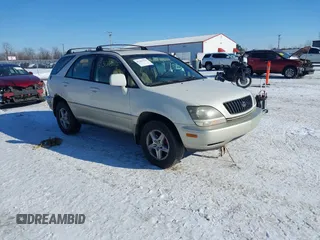 1999 Lexus RX 300 Luxury SUV with VIN JT6HF10U9X0078840, listed as a IAAI auction lot 41361325 with 231,519 mi miles. Bid and sale history available at carsss.com. Image 1.