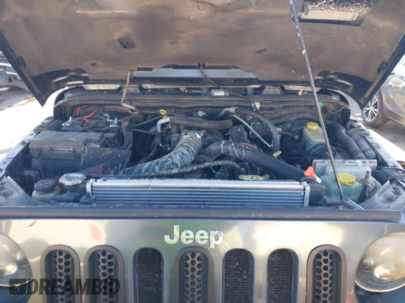 2008 Jeep Wrangler Sahara with VIN 1J4FA54108L543764, listed as a IAAI auction lot 41867734 with 186,145 mi miles and . Bid and sale history available at DreamBid. Image 10.