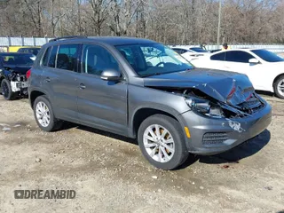 2014 Volkswagen Tiguan SE z VIN WVGAV3AX0EW511694, wystawiony jako IAAI lot #41811345 z przebiegiem 95 129 mil mil oraz . Historia ofert i sprzedaży dostępna na DreamBid. Obrazek 1.
