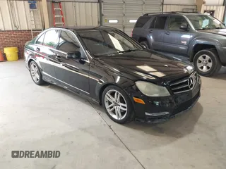 2014 Mercedes-Benz C 250 Sport with VIN WDDGF4HB7ER312397, listed as a IAAI auction lot 42596265 with 148,721 mi miles and . Bid and sale history available at DreamBid. Image 1.