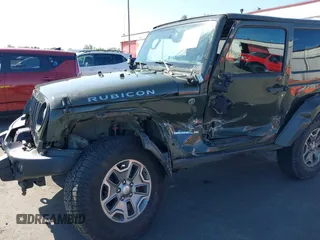 2015 Jeep Wrangler Rubicon Hard Rock with VIN 1C4BJWCGXFL771669, listed as a IAAI auction lot 42057423 with 36,996 mi miles and . Bid and sale history available at DreamBid. Image 6.