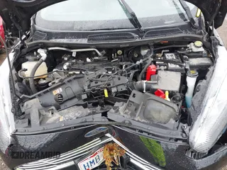 2018 Ford Fiesta SE z VIN 3FADP4BJ0JM104163, wystawiony jako IAAI lot #42306860 z przebiegiem 45 992 mil mil oraz . Historia ofert i sprzedaży dostępna na DreamBid. Obrazek 10.
