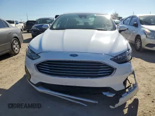 2019 Ford Fusion Hybrid SE with VIN 3FA6P0LU9KR139329, listed as a Copart auction lot 36225173 with 66,274 mi miles. Bid and sale history available at carsss.com. Image 5.