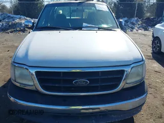 2000 Ford F-150 z VIN 2FTPX17L7YCA51774, wystawiony jako IAAI lot #41426958 z przebiegiem 421 412 mil mil oraz . Historia ofert i sprzedaży dostępna na DreamBid. Obrazek 12.