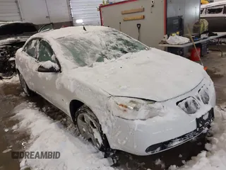 2009 Pontiac G6 w/1SA *Ltd Avail* with VIN 1G2ZG57B094141667, listed as a IAAI auction lot 41584261 with 100,702 mi miles. Bid and sale history available at carsss.com. Image 1.