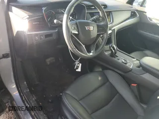 2023 Cadillac XT6 FWD Luxury z VIN 1GYKPAR48PZ115719, wystawiony jako Copart lot #87848435 z przebiegiem 17 597 mil mil oraz Szkoda całkowita • Salvage title. Historia ofert i sprzedaży dostępna na DreamBid. Obrazek 8.