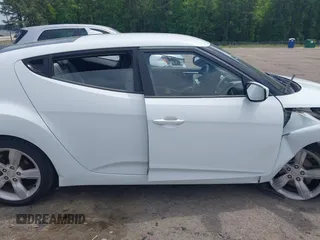2012 Hyundai Veloster w/Gray Int с VIN KMHTC6AD6CU026944, выставлен на аукционе IAAI как лот 42216988 с пробегом 61 147 миль миль и . История ставок и продаж доступна на DreamBid. Изображение 13.