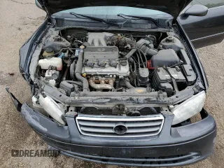 2001 Toyota Camry LE z VIN JT2BF22K010295564, wystawiony jako Copart lot #55111755 z przebiegiem 379 337 mil mil oraz Szkody całkowita. Historia ofert i sprzedaży dostępna na DreamBid. Obrazek 11.