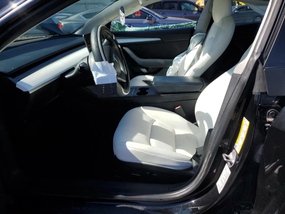 2022 Tesla Model 3 with VIN 5YJ3E1EA5NF102554, listed as a Copart auction lot 53195075 with 62,453 mi miles and Salvage Title. Bid and sale history available at DreamBid. Image 7.