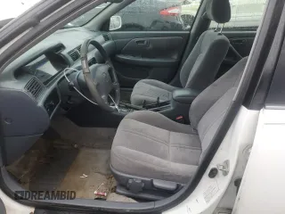 1999 Toyota Camry LE z VIN 4T1BG22K4XU485515, wystawiony jako Copart lot #55110155 z przebiegiem 230 079 mil mil oraz Czysty tytuł • Clean title. Historia ofert i sprzedaży dostępna na DreamBid. Obrazek 7.