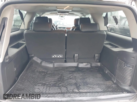 2014 Chevrolet Suburban LTZ with VIN 1GNSCKE05ER173446, listed as a IAAI auction lot 41047096 with 189,049 mi miles and . Bid and sale history available at DreamBid. Image 18.