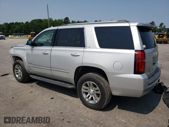 2018 Chevrolet Tahoe LT with VIN 1GNSKBKC7JR382344, listed as a Copart auction lot 58768135 with 103,557 mi miles and Salvage title. Bid and sale history available at DreamBid. Image 2.