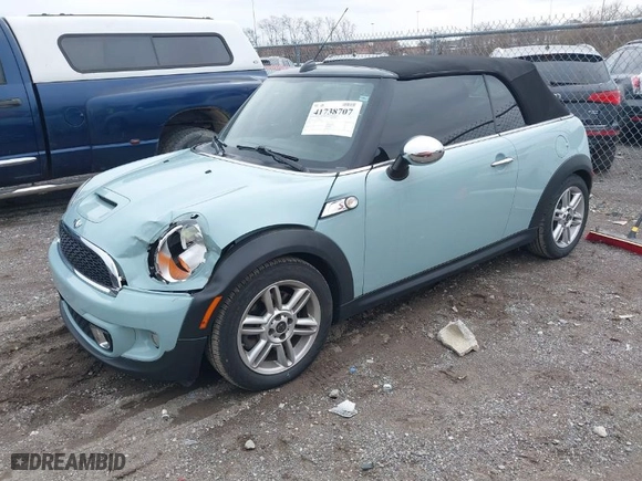 2011 MINI Cooper Convertible s with VIN WMWZP3C5XBTX84469, listed as a IAAI auction lot 41738707 with 77,464 mi miles. Bid and sale history available at carsss.com. Image 2.