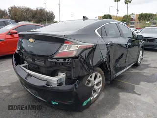 2016 Chevrolet Volt Premier with VIN 1G1RD6S51GU116956, listed as a IAAI auction lot 41841956 with 66,864 mi miles. Bid and sale history available at carsss.com. Image 4.