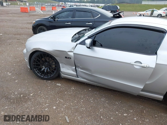 2013 Ford Mustang GT with VIN 1ZVBP8CF7D5281965, listed as a IAAI auction lot 40408688 with 121,477 mi miles. Bid and sale history available at carsss.com. Image 6.