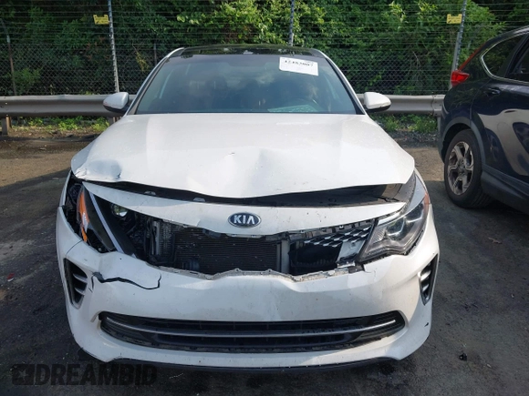 2017 Kia Optima SX z VIN 5XXGW4L26HG125516, wystawiony jako IAAI lot #42483007 z przebiegiem 152 400 mil mil oraz . Historia ofert i sprzedaży dostępna na DreamBid. Obrazek 12.