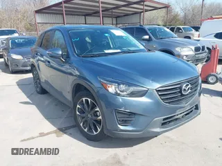 2016 Mazda CX-5 Grand Touring with VIN JM3KE2DYXG0605652, listed as a IAAI auction lot 41789592 with 238,700 mi miles. Bid and sale history available at carsss.com. Image 1.