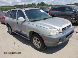 2004 Hyundai Santa Fe GLS with VIN KM8SC13DX4U592070, listed as a IAAI auction lot 42030363 with 296,823 mi miles. Bid and sale history available at carsss.com. Image 1.