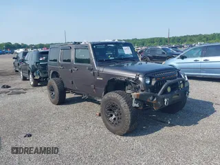 2016 Jeep Wrangler Unlimited Sport with VIN 1C4BJWDG9GL211030, listed as a IAAI auction lot 42459945 with 61,671 mi miles and . Bid and sale history available at DreamBid. Image 1.