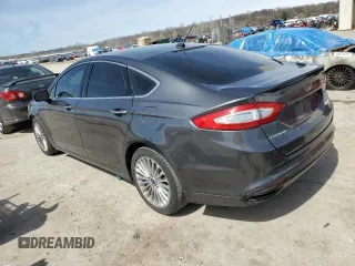 2016 Ford Fusion Titanium with VIN 3FA6P0D9XGR406186, listed as a Copart auction lot 50601175 with 207,220 mi miles and Salvage title. Bid and sale history available at DreamBid. Image 2.