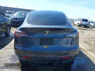 2020 Tesla Model Y Long Range with VIN 5YJYGDEF8LF000658, listed as a IAAI auction lot 41669246 with 44,281 mi miles and . Bid and sale history available at DreamBid. Image 17.