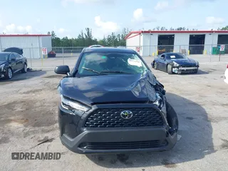 2024 Toyota Corolla Cross L with VIN 7MUAAAAG7RV101166, listed as a IAAI auction lot 42374340 with 11,213 mi miles and . Bid and sale history available at DreamBid. Image 12.