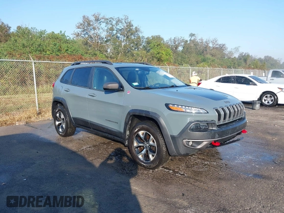 2014 Jeep Cherokee Trailhawk z VIN 1C4PJMBS2EW212341, wystawiony jako IAAI lot #40672694 z przebiegiem 108 622 mil mil oraz . Historia ofert i sprzedaży dostępna na DreamBid. Obrazek 1.