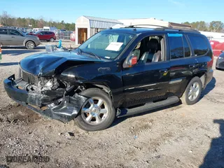 2005 GMC Envoy SLE with VIN 1GKDS13S152246568, listed as a IAAI auction lot 41293887 with 315,882 mi miles. Bid and sale history available at carsss.com. Image 17.