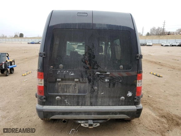 2012 Ford Transit Connect Wagon XLT with VIN NM0KS9BN5CT111837, listed as a Copart auction lot 49271645 with 118,239 mi miles and Salvage Title. Bid and sale history available at carsss.com. Image 6.