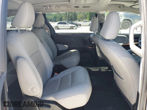 2020 Toyota Sienna XLE z VIN 5TDDZ3DC3LS236382, wystawiony jako Copart lot #57954705 z przebiegiem 69 761 mil mil oraz Szkoda całkowita • Salvage title. Historia ofert i sprzedaży dostępna na DreamBid. Obrazek 11.