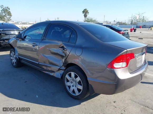 2011 Honda Civic Sdn LX with VIN 19XFA1F54BE048532, listed as a IAAI auction lot 41636667 with 117,065 mi miles. Bid and sale history available at carsss.com. Image 3.