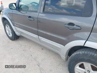 2005 Ford Escape Hybrid with VIN 1FMCU95H55KC07544, listed as a IAAI auction lot 42104756 with 250,109 mi miles and . Bid and sale history available at DreamBid. Image 12.
