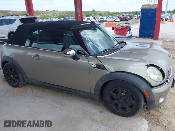 2010 MINI Convertible with VIN WMWMR3C52ATU97825, listed as a IAAI auction lot 42349417 with 64,045 mi miles and . Bid and sale history available at DreamBid. Image 13.