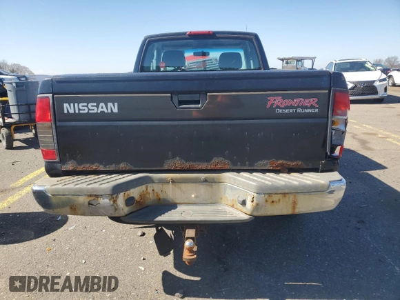 2000 Nissan Frontier XE z VIN 1N6ED26T3YC411827, wystawiony jako Copart lot #48612455 z przebiegiem 140 373 mil mil oraz Czysty tytuł • Clean title. Historia ofert i sprzedaży dostępna na DreamBid. Obrazek 6.